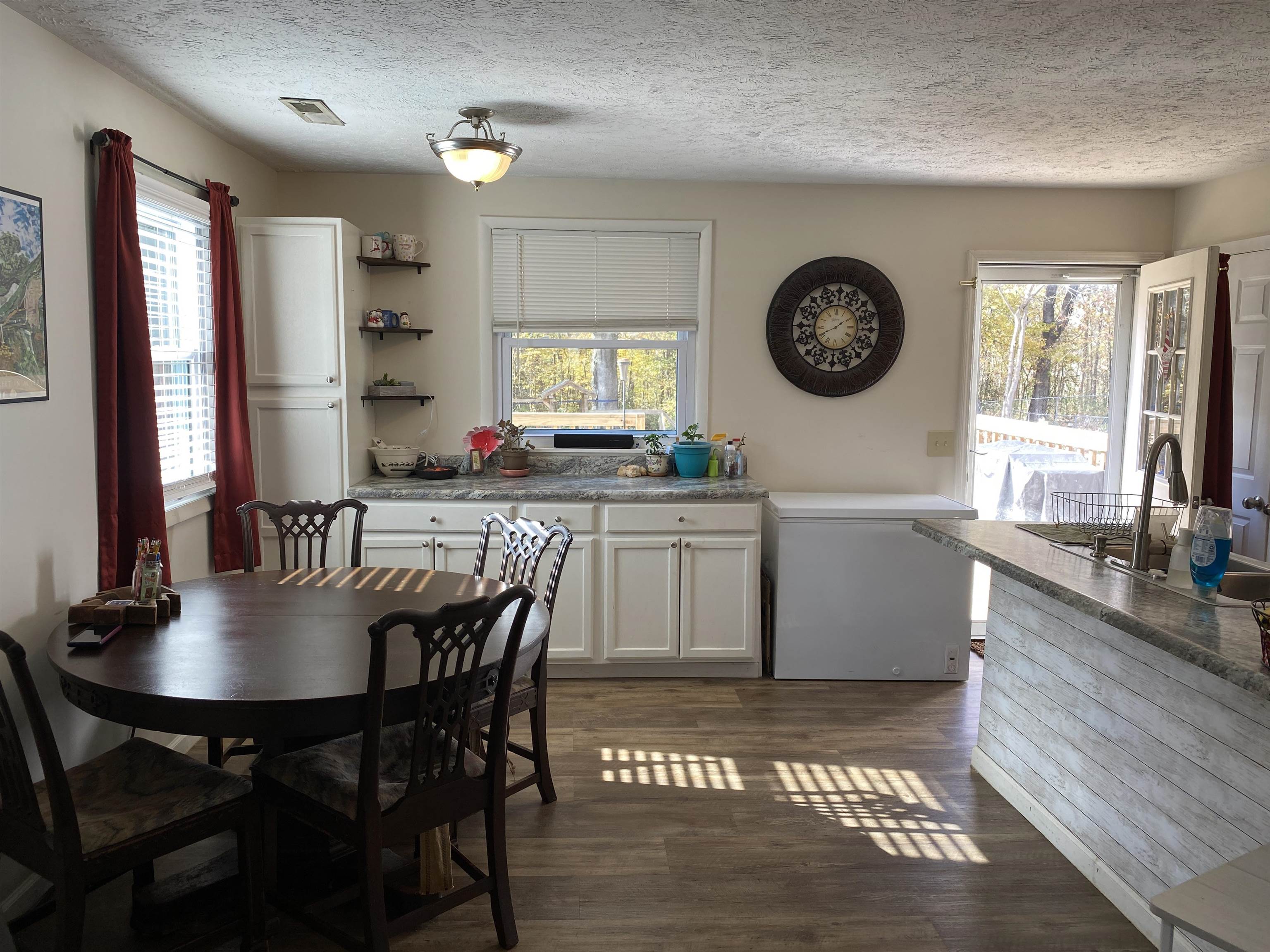 140 Ancil Way Savannah, TN 38372 - Photo 11 of 37 a kitchen with a dining table and chairs