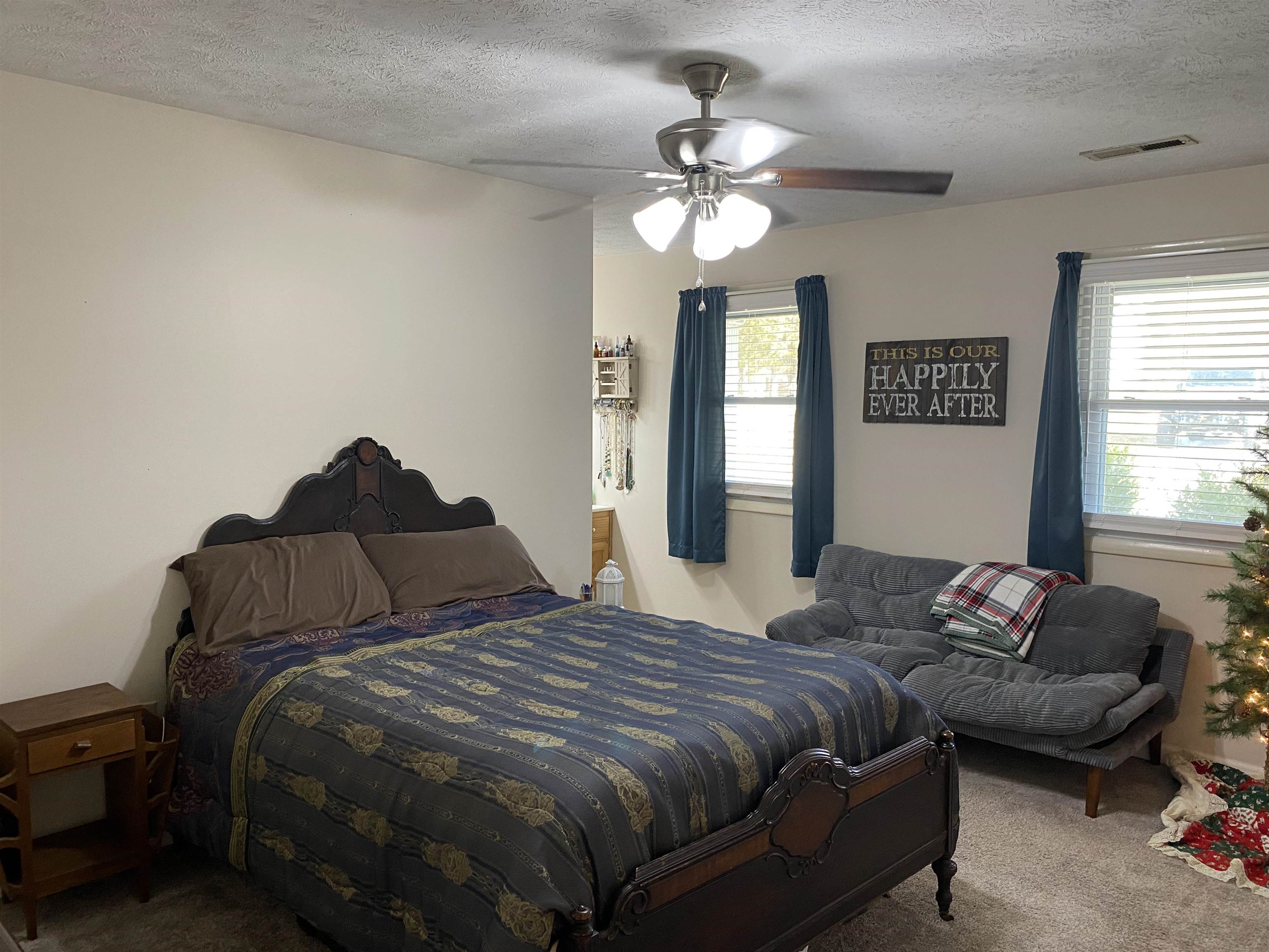 140 Ancil Way Savannah, TN 38372 - Photo 18 of 37 a bedroom with bed and window