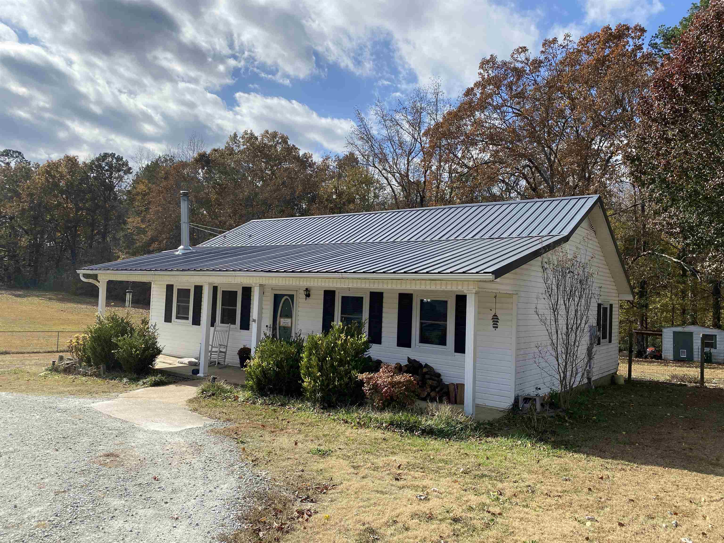 140 Ancil Way Savannah, TN 38372 - Photo 2 of 37 a view of a house with backyard and garden