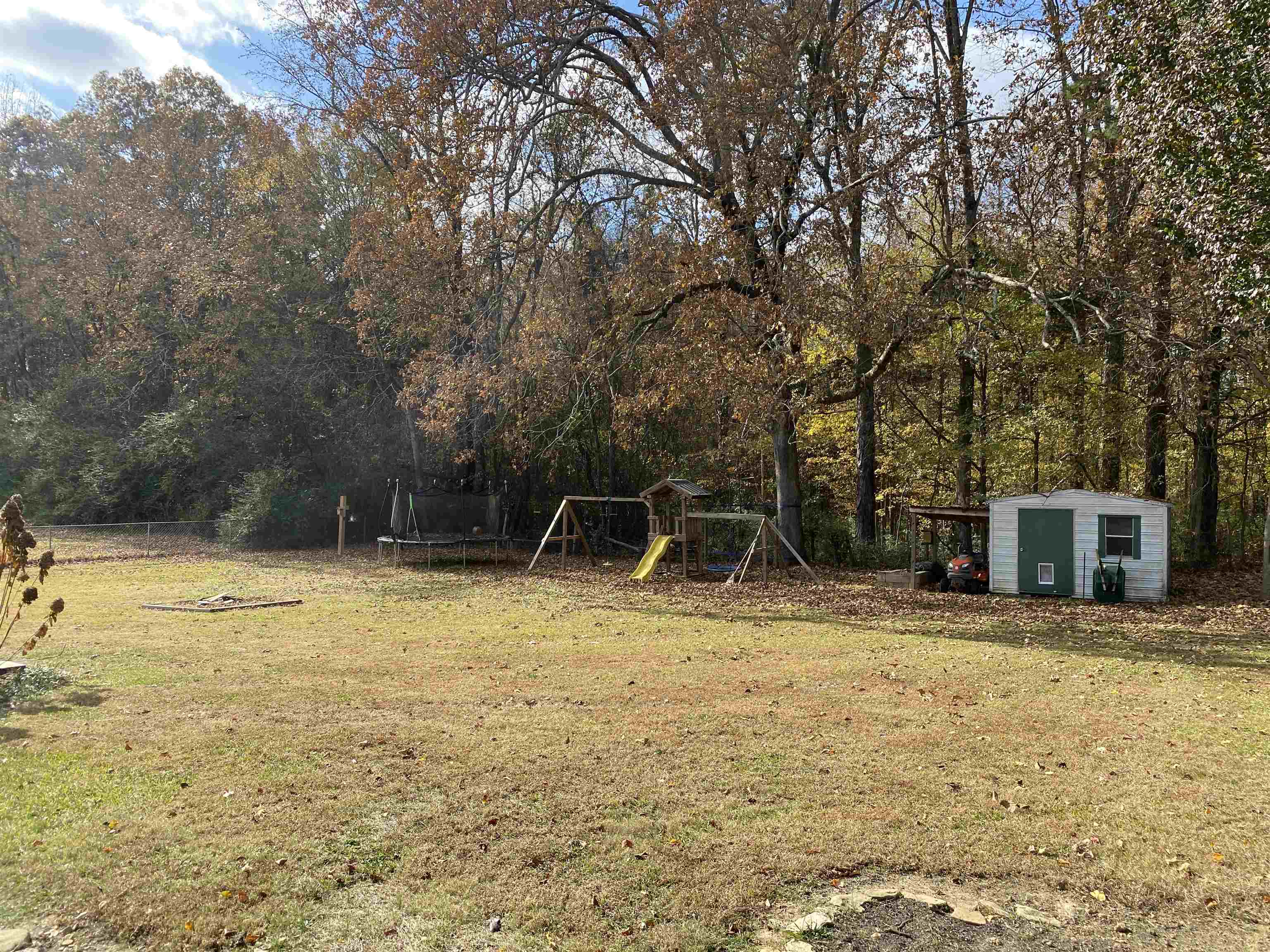 140 Ancil Way Savannah, TN 38372 - Photo 31 of 37 a view of a swimming pool with an outdoor seating and a yard