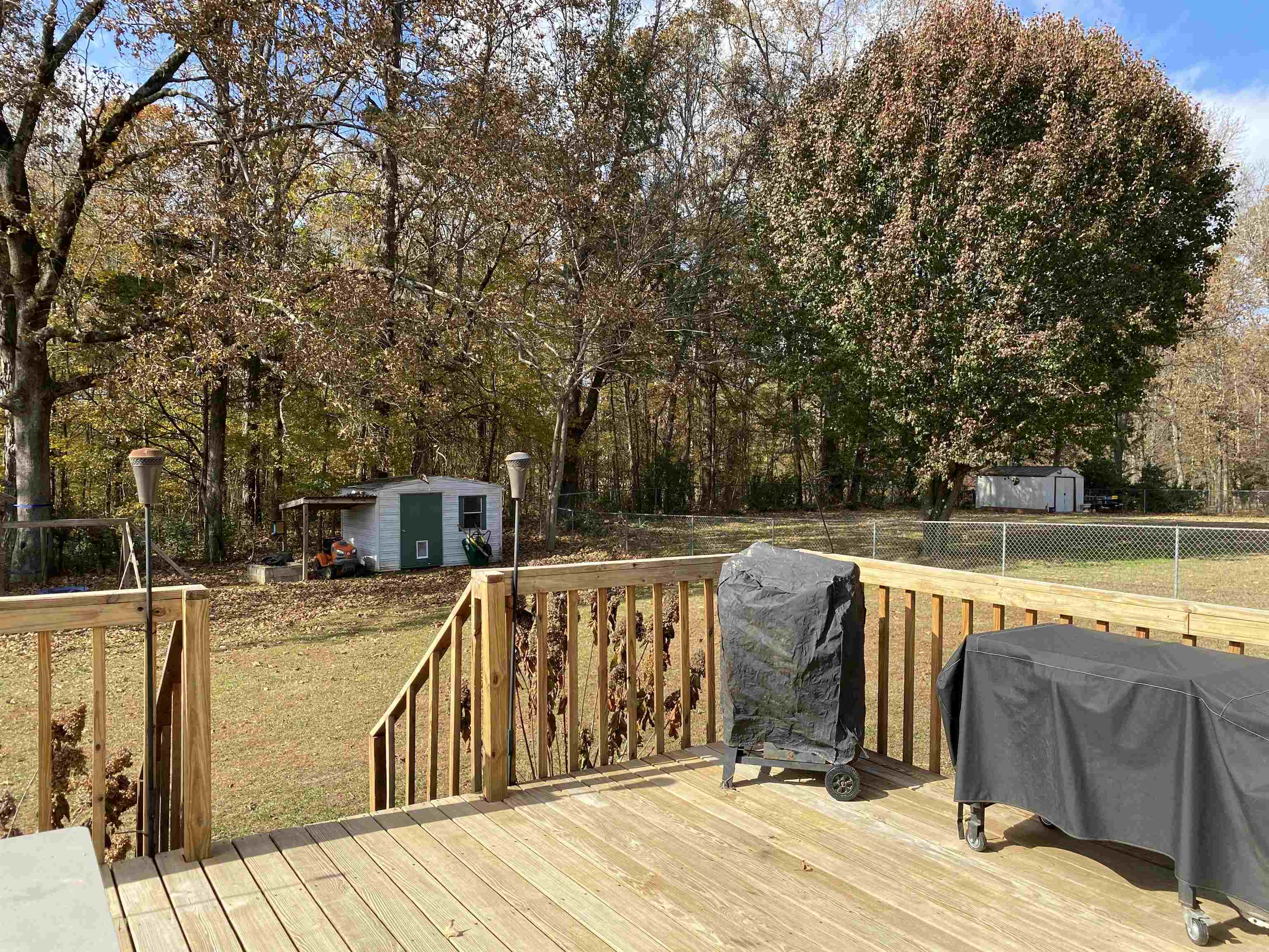 140 Ancil Way Savannah, TN 38372 - Photo 34 of 37 a view of a patio with wooden floor and barbeque oven