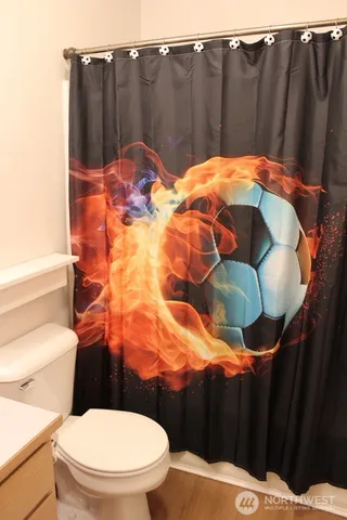 a bathroom with a sink and toilet