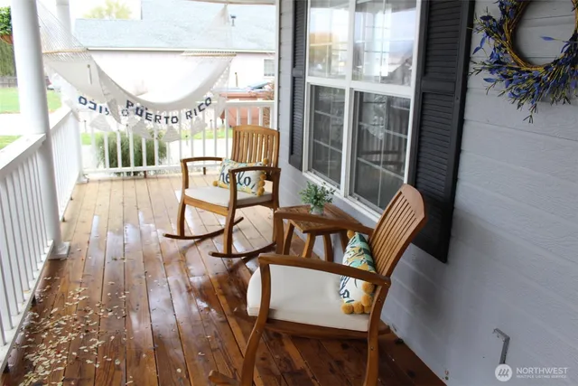 a view of a living room and a balcony