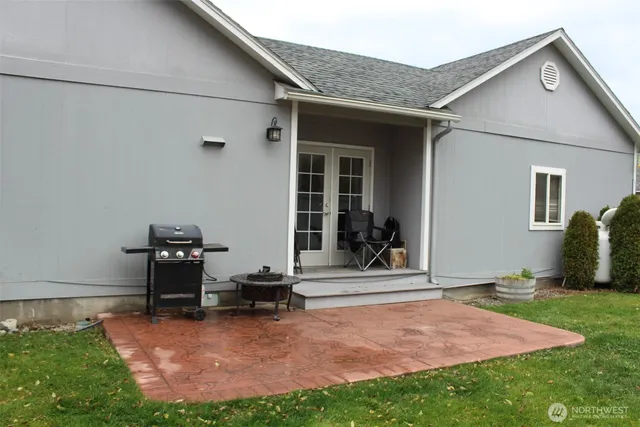 a backyard of a house with seating space