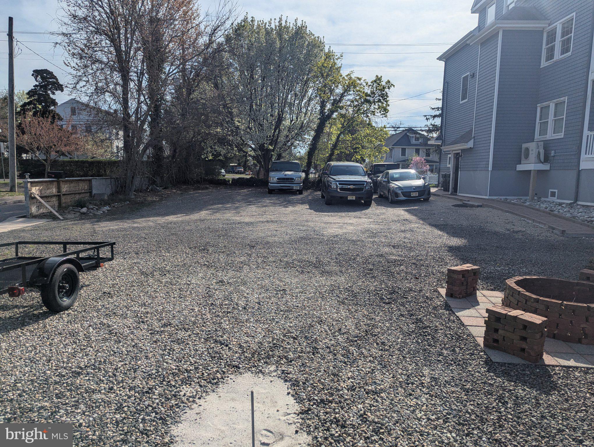 230 South Green Street Tuckerton, NJ 08087 - Photo 14 of 72 Spacious gravel lot with greenery.