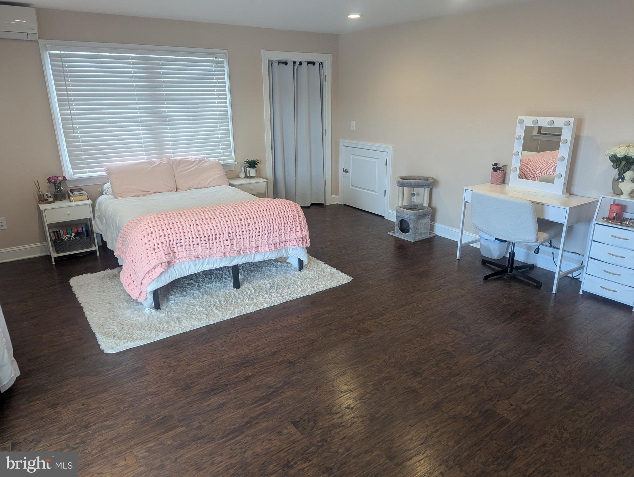 230 South Green Street Tuckerton, NJ 08087 - Photo 26 of 72 a spacious bedroom with a bed and wooden floor