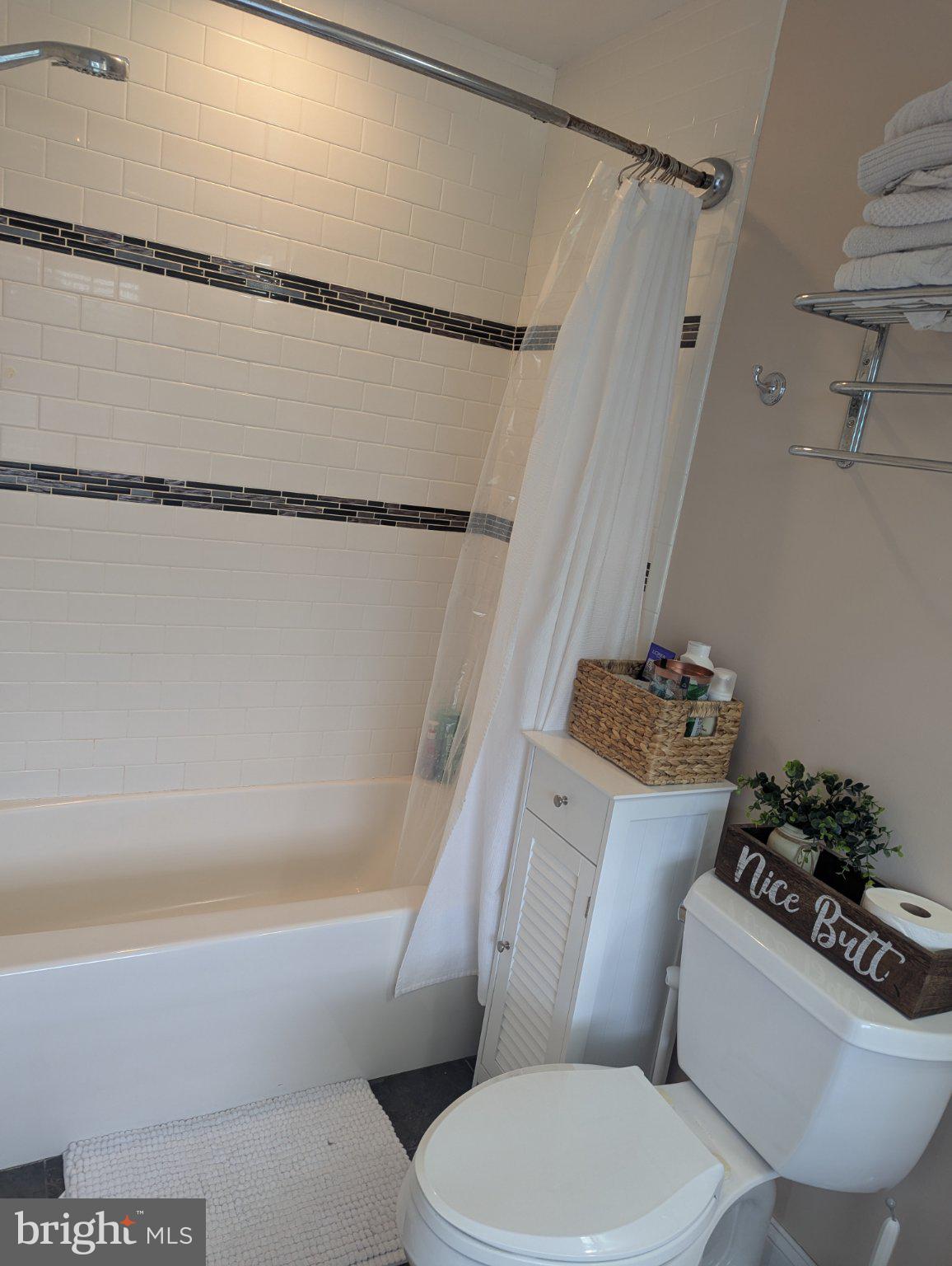 230 South Green Street Tuckerton, NJ 08087 - Photo 30 of 72 a white bath tub sitting next to a white toilet and sink