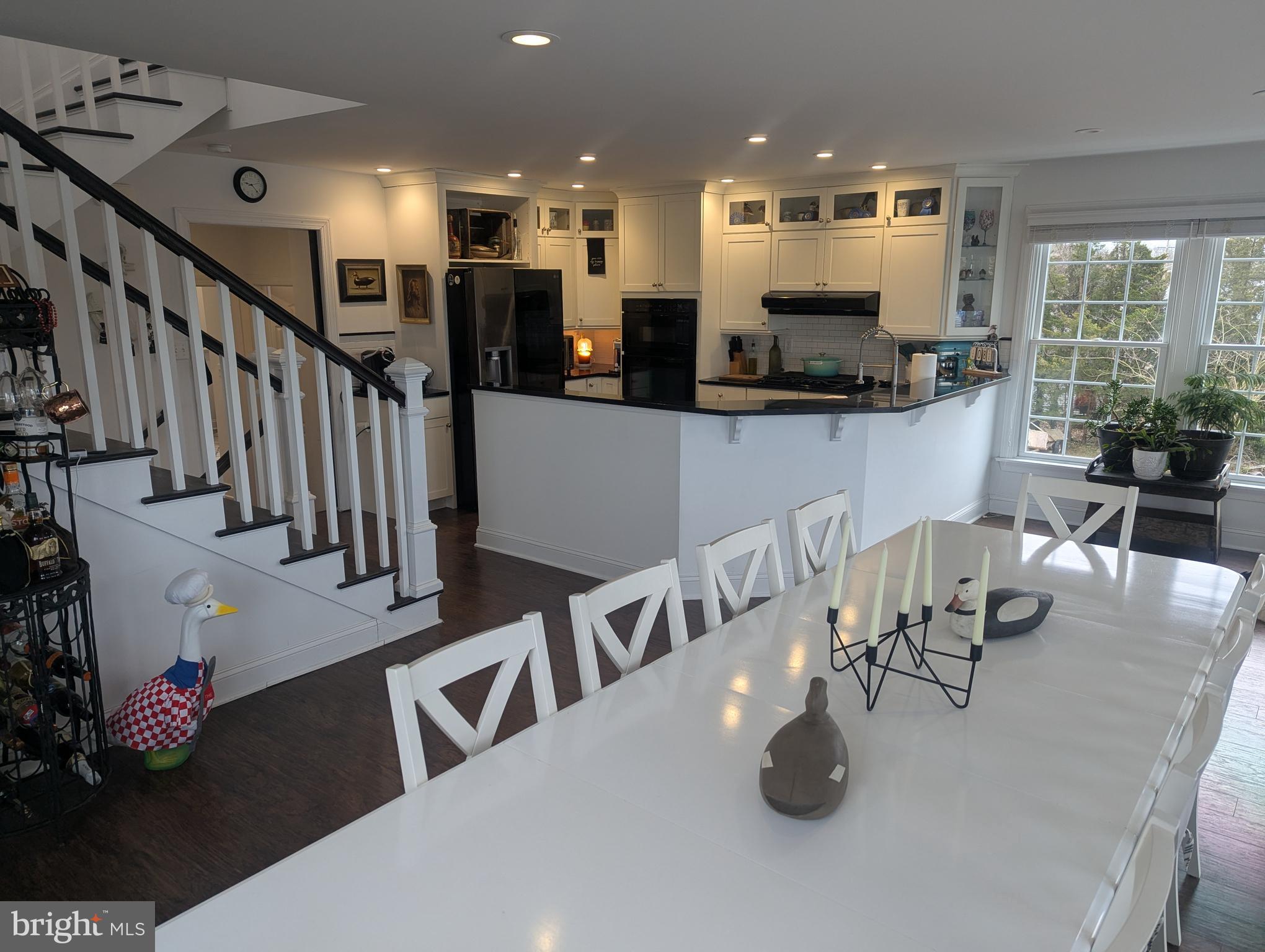 230 South Green Street Tuckerton, NJ 08087 - Photo 38 of 72 a dining room with furniture and a floor to ceiling window