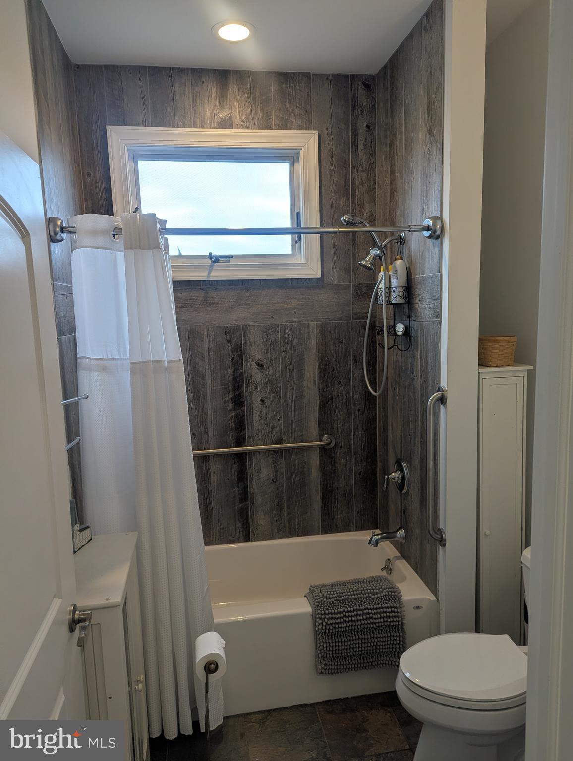 230 South Green Street Tuckerton, NJ 08087 - Photo 49 of 72 a bathroom with a toilet a sink and bathtub