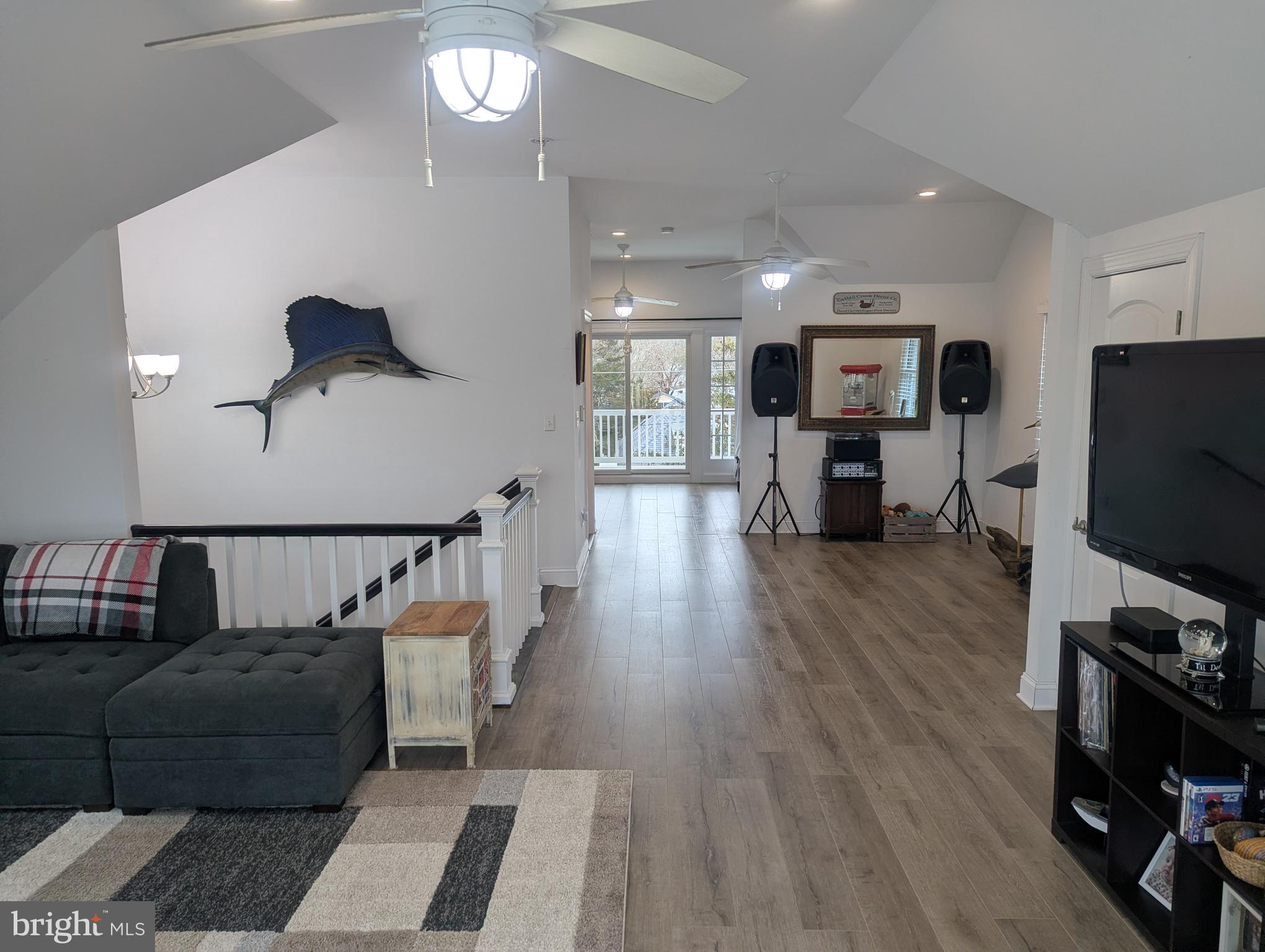 230 South Green Street Tuckerton, NJ 08087 - Photo 56 of 72 a living room with furniture and a flat screen tv