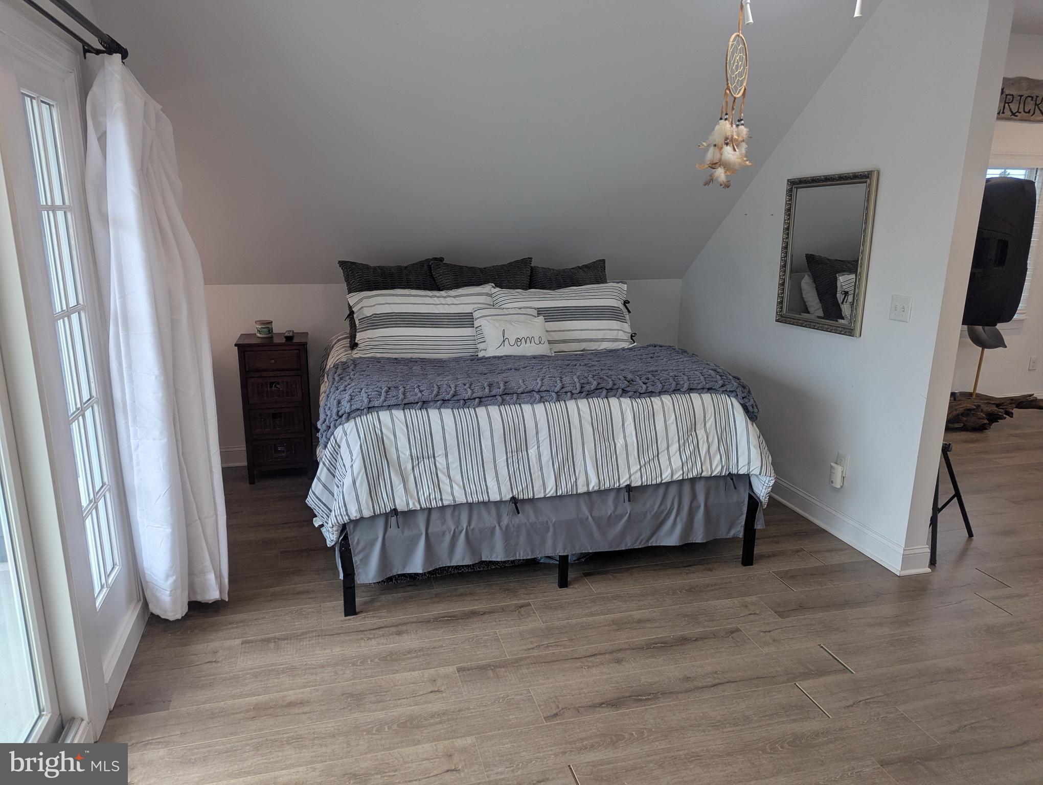 230 South Green Street Tuckerton, NJ 08087 - Photo 68 of 72 a bedroom with a bed tv and a window