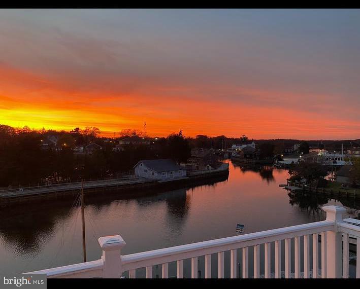 230 South Green Street Tuckerton, NJ 08087 - Photo 71 of 72 a view of balcony with two chairs and wooden floor