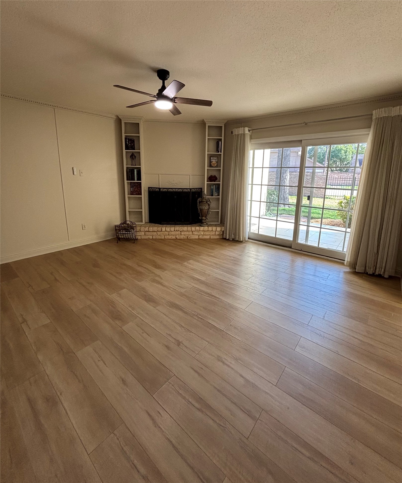 14515 Wunderlich Drive, Unit 315 Houston, TX 77069 - Photo 16 of 37 Living Room with French Doors Leading to the Covered Patio
