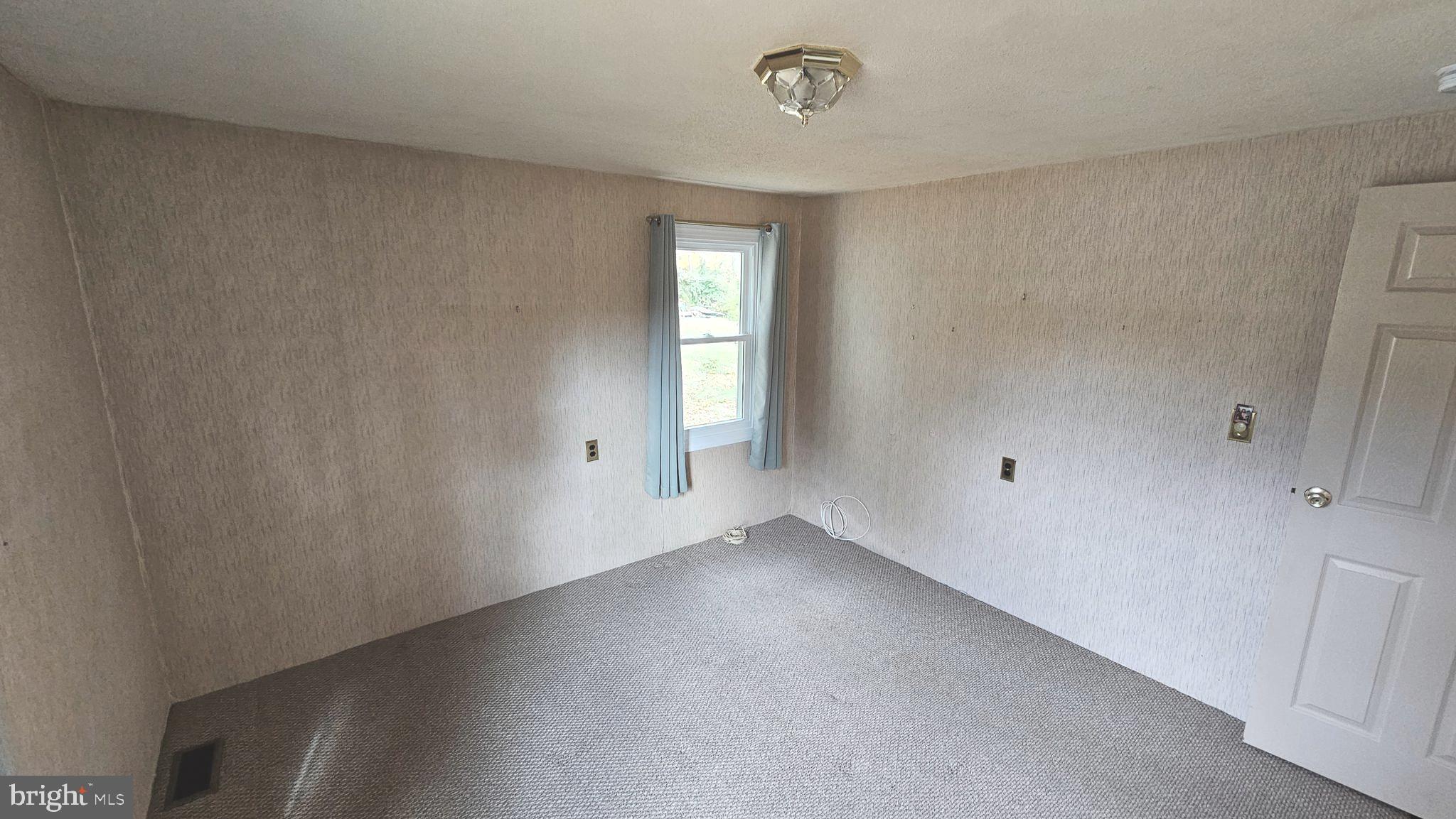 53 Crosswicks Chesterfield Road Chesterfield, NJ 08515 - Photo 19 of 35 an empty room with windows and closet