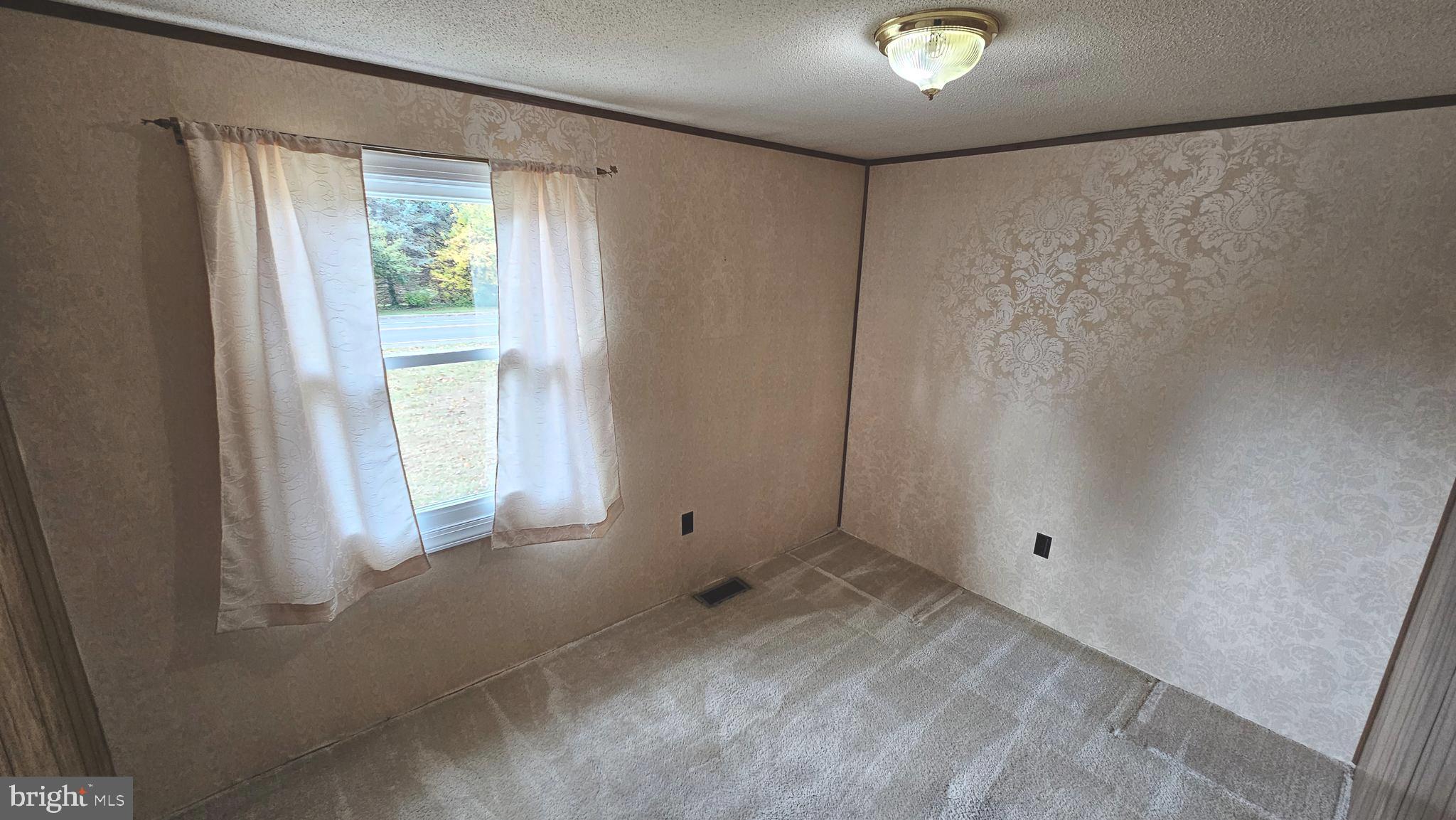 53 Crosswicks Chesterfield Road Chesterfield, NJ 08515 - Photo 21 of 35 a view of an empty room with a window