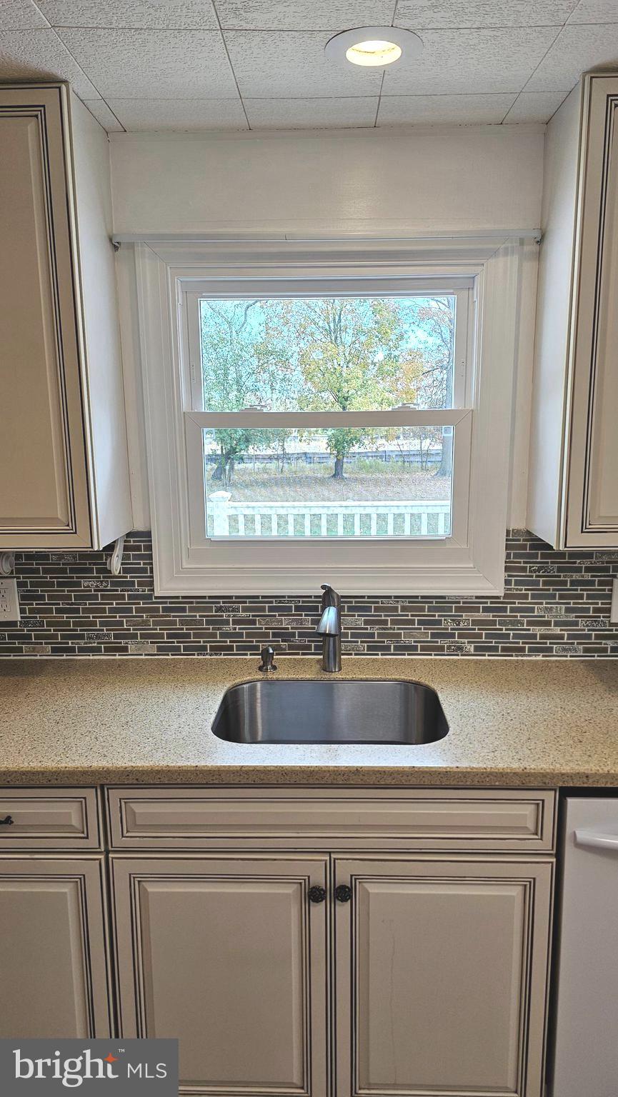 53 Crosswicks Chesterfield Road Chesterfield, NJ 08515 - Photo 10 of 35 a view with granite countertop a sink and a window