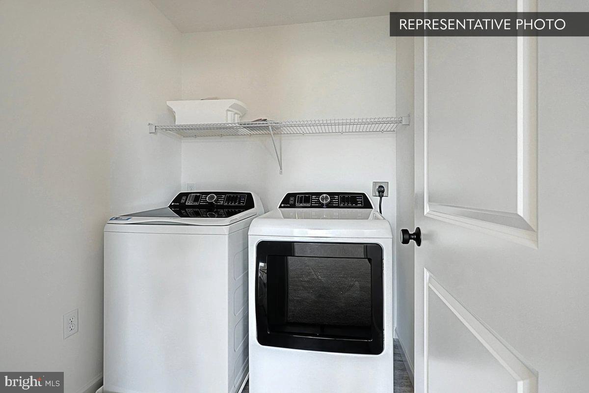 Black Cherry Plan At Hills Spring Grove, PA 17362 - Photo 34 of 42 a view of washer and dryer