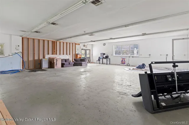 a view of a livingroom with furniture and window