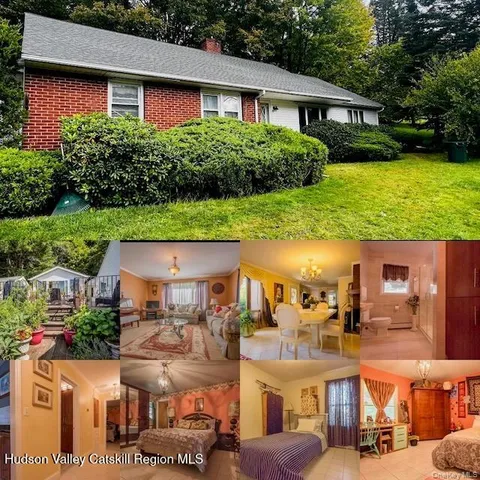 a view of multiple houses with a yard