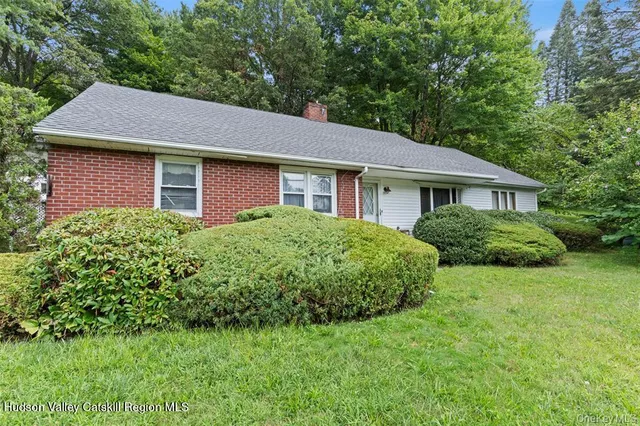 a house that has a lot of plants in it