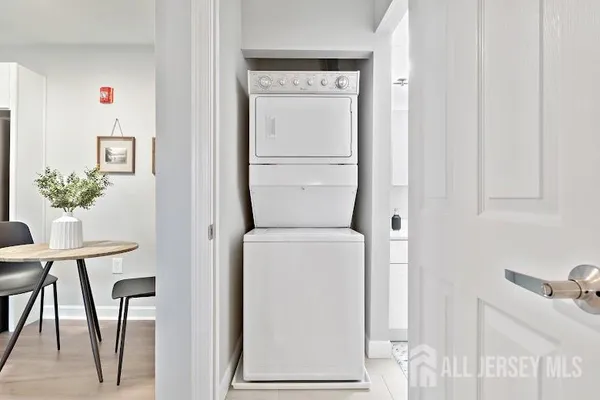 a room with furniture and a potted plant