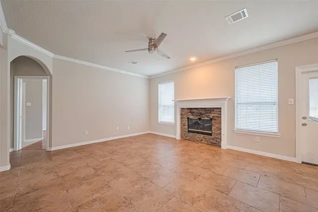a view of an empty room with stairs