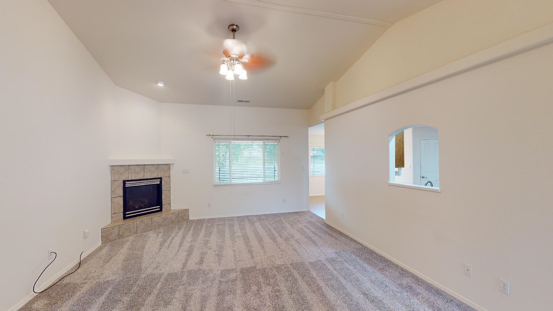 210 Limestone Circle Grand Junction, CO 81503 - Photo 2 of 32 wooden floor in an empty room with a window