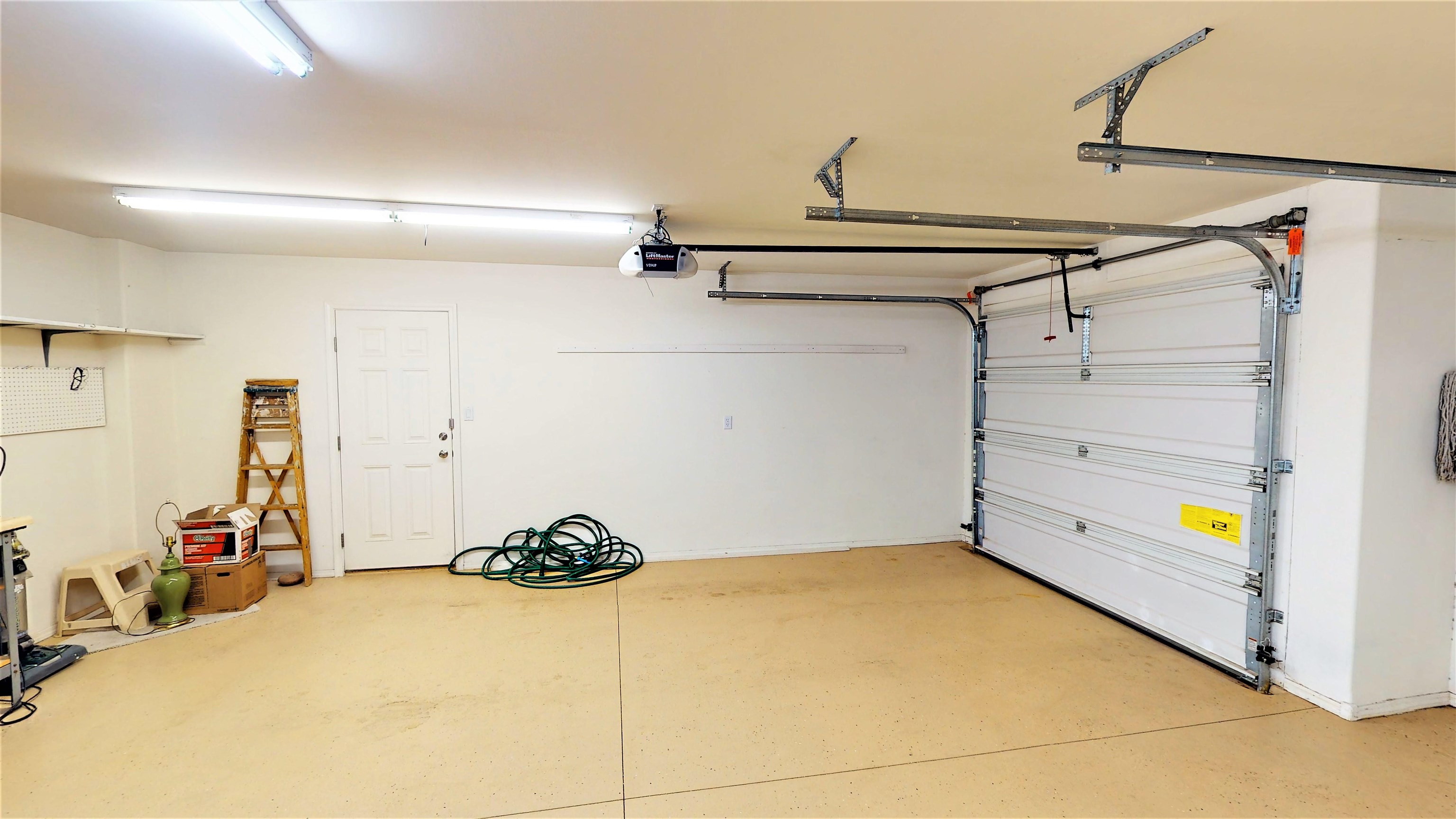 210 Limestone Circle Grand Junction, CO 81503 - Photo 21 of 32 a bedroom with a bed and a ceiling fan