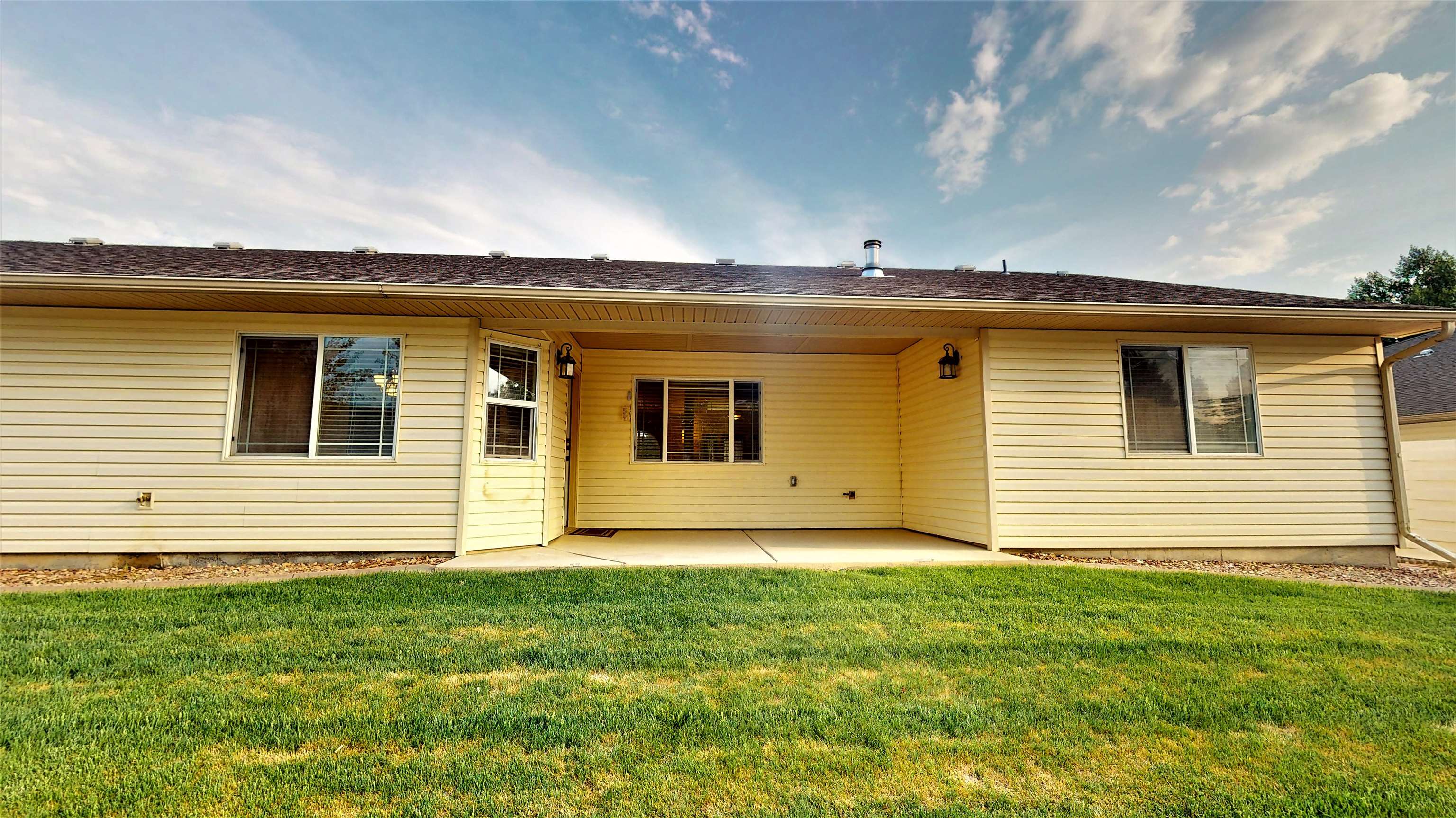 210 Limestone Circle Grand Junction, CO 81503 - Photo 24 of 32 a view of a house with a backyard