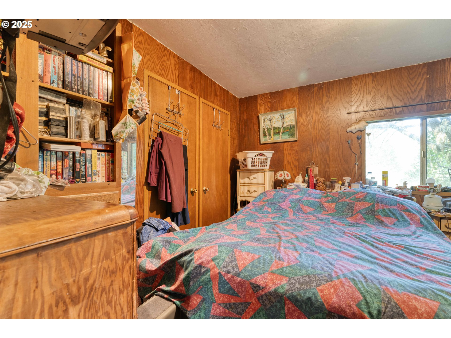 56010 Gold Brick Road Myrtle Point, OR 97458 - Photo 18 of 27 a bedroom with a bed and a window