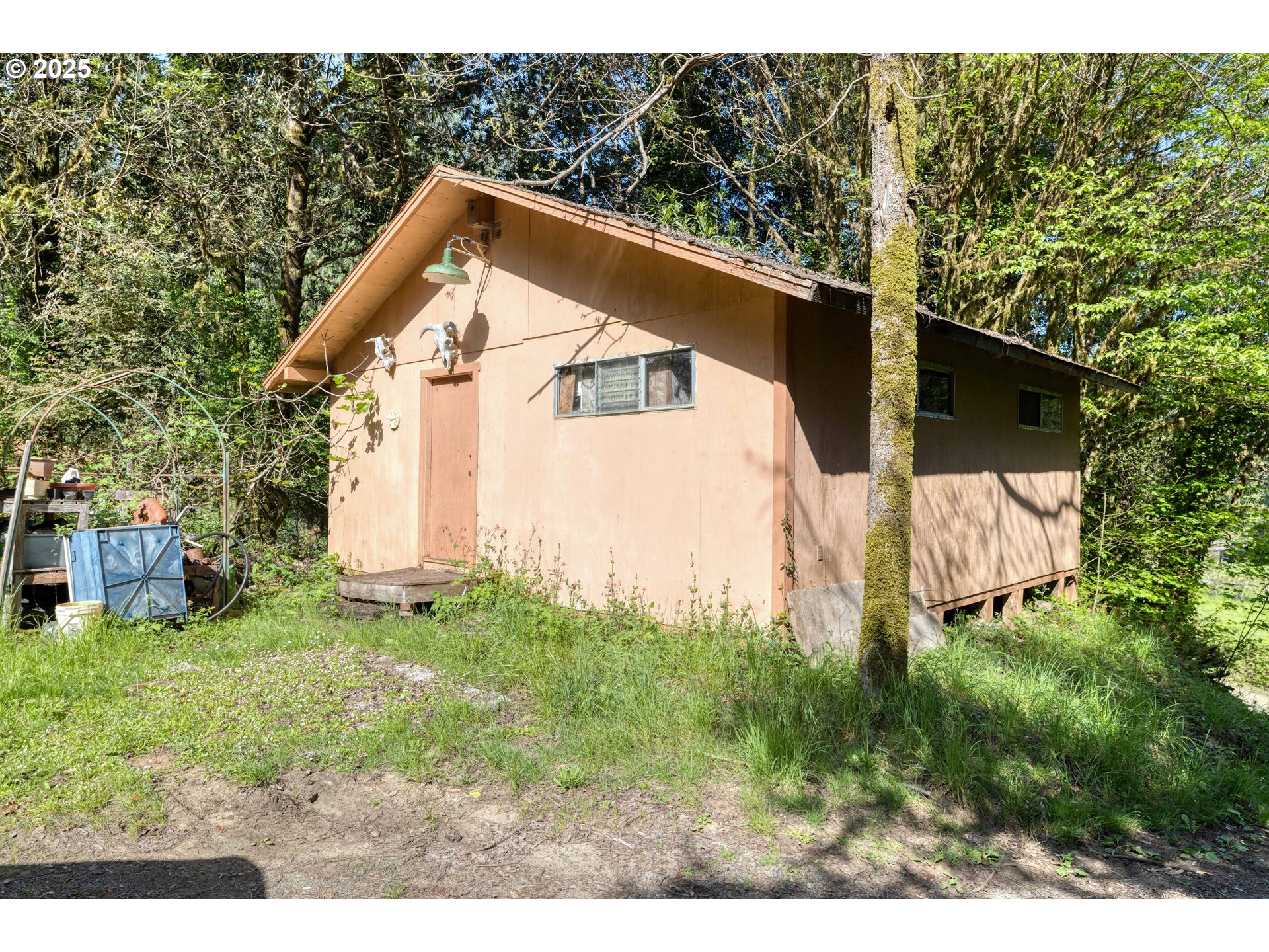 56010 Gold Brick Road Myrtle Point, OR 97458 - Photo 20 of 27 a view of a house with a yard