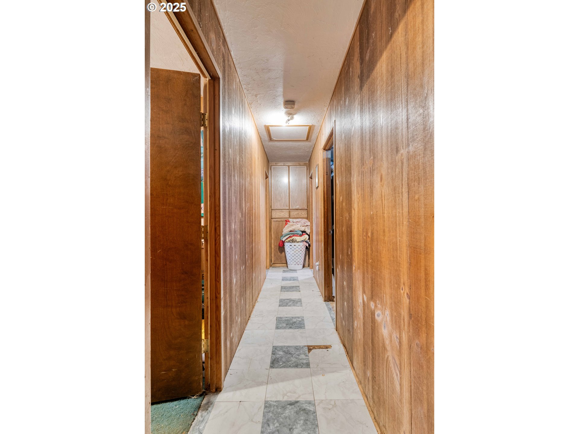 56010 Gold Brick Road Myrtle Point, OR 97458 - Photo 26 of 27 a view of a hallway with wooden floor