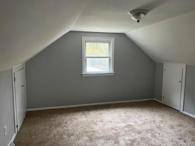 an empty room with window