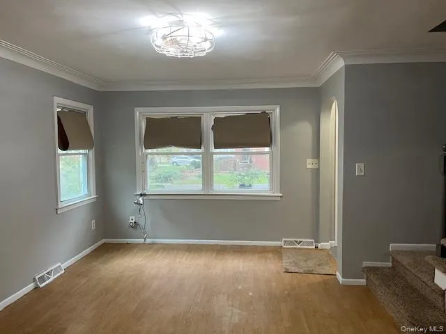 an empty room with windows