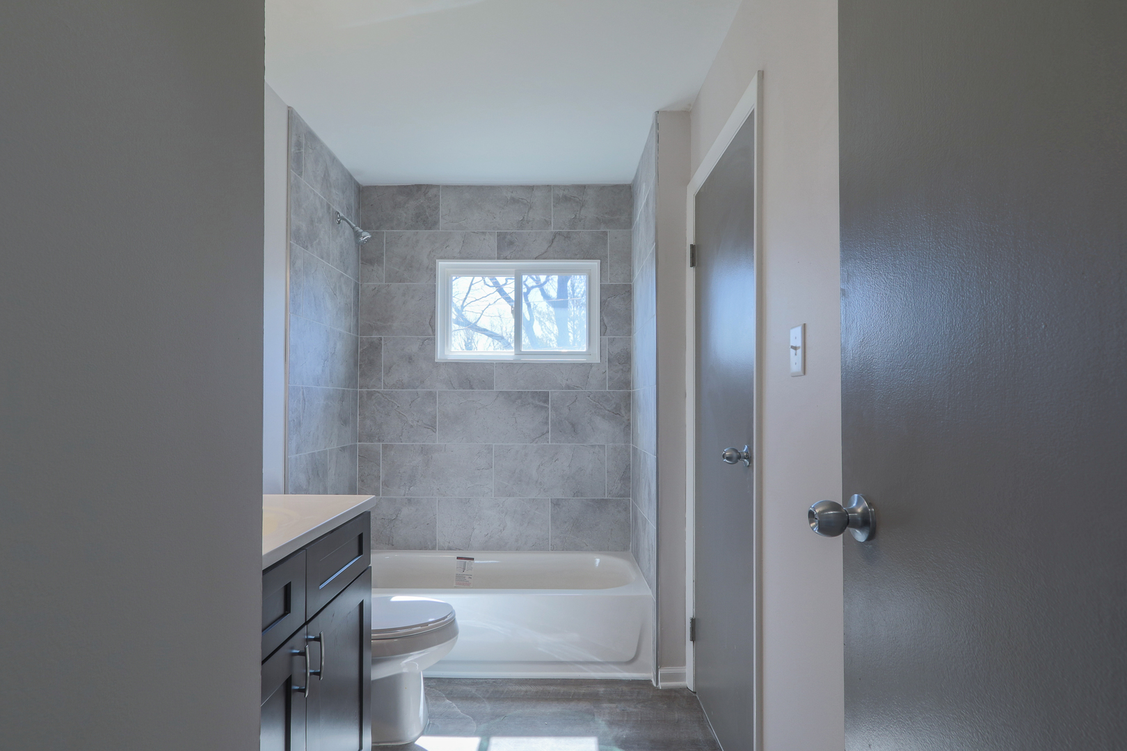 229 Riverside Drive Bolingbrook, IL 60440 - Photo 17 of 35 a bathroom with a bathtub and a toilet