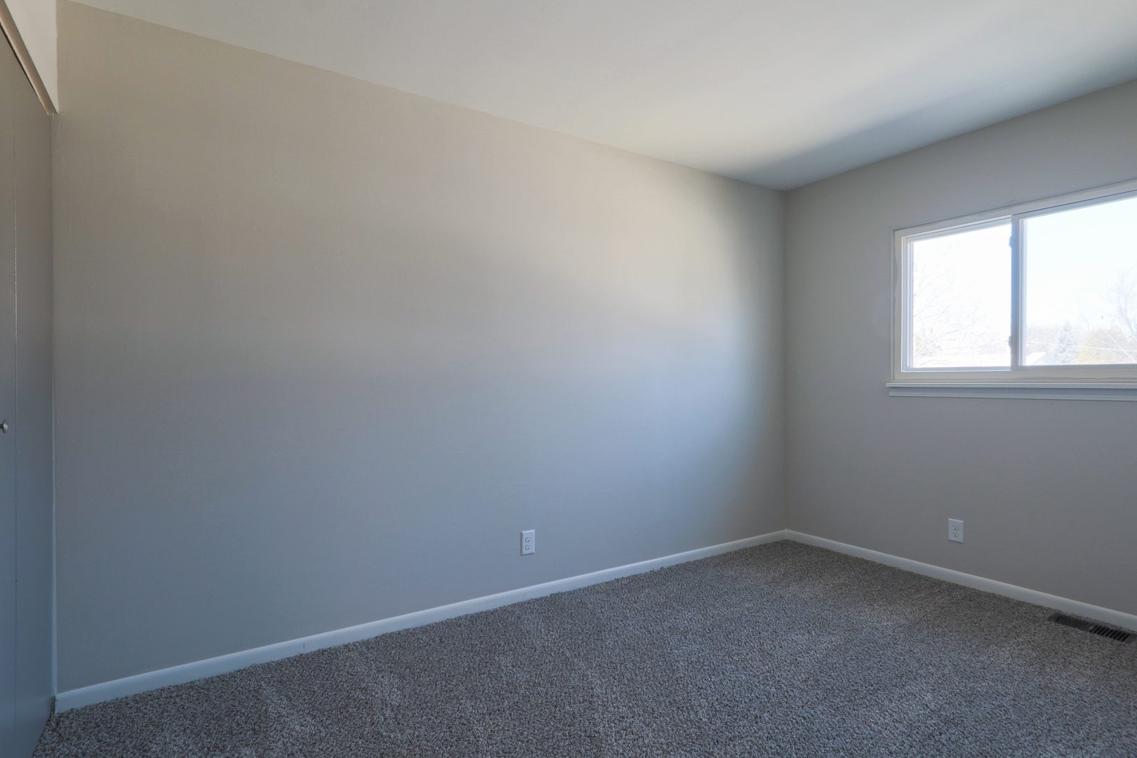 229 Riverside Drive Bolingbrook, IL 60440 - Photo 21 of 35 an empty room with a window