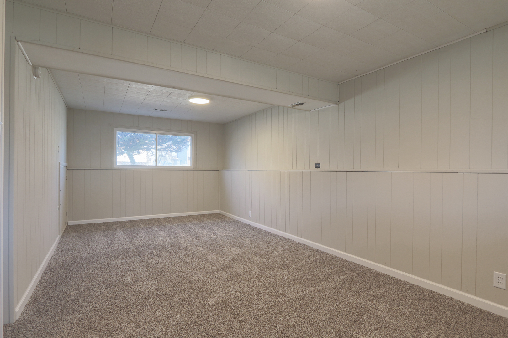 229 Riverside Drive Bolingbrook, IL 60440 - Photo 27 of 35 a view of an empty room with a window
