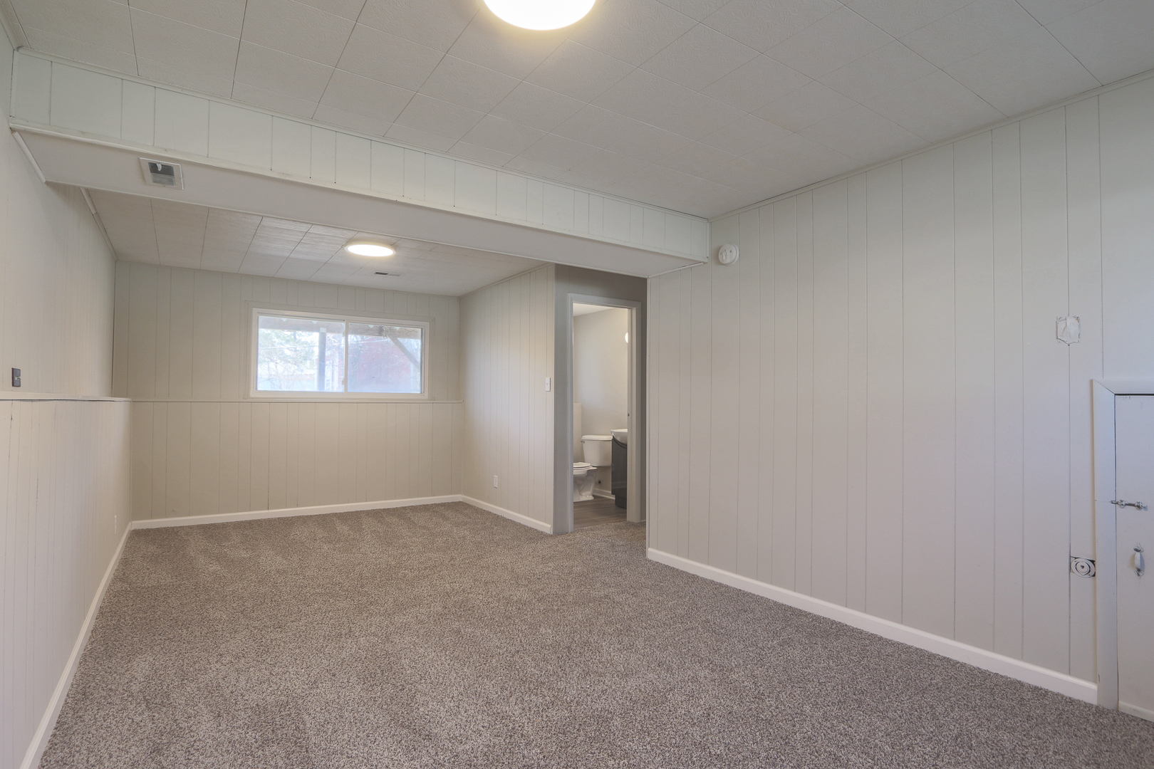 229 Riverside Drive Bolingbrook, IL 60440 - Photo 29 of 35 a view of an empty room with a window