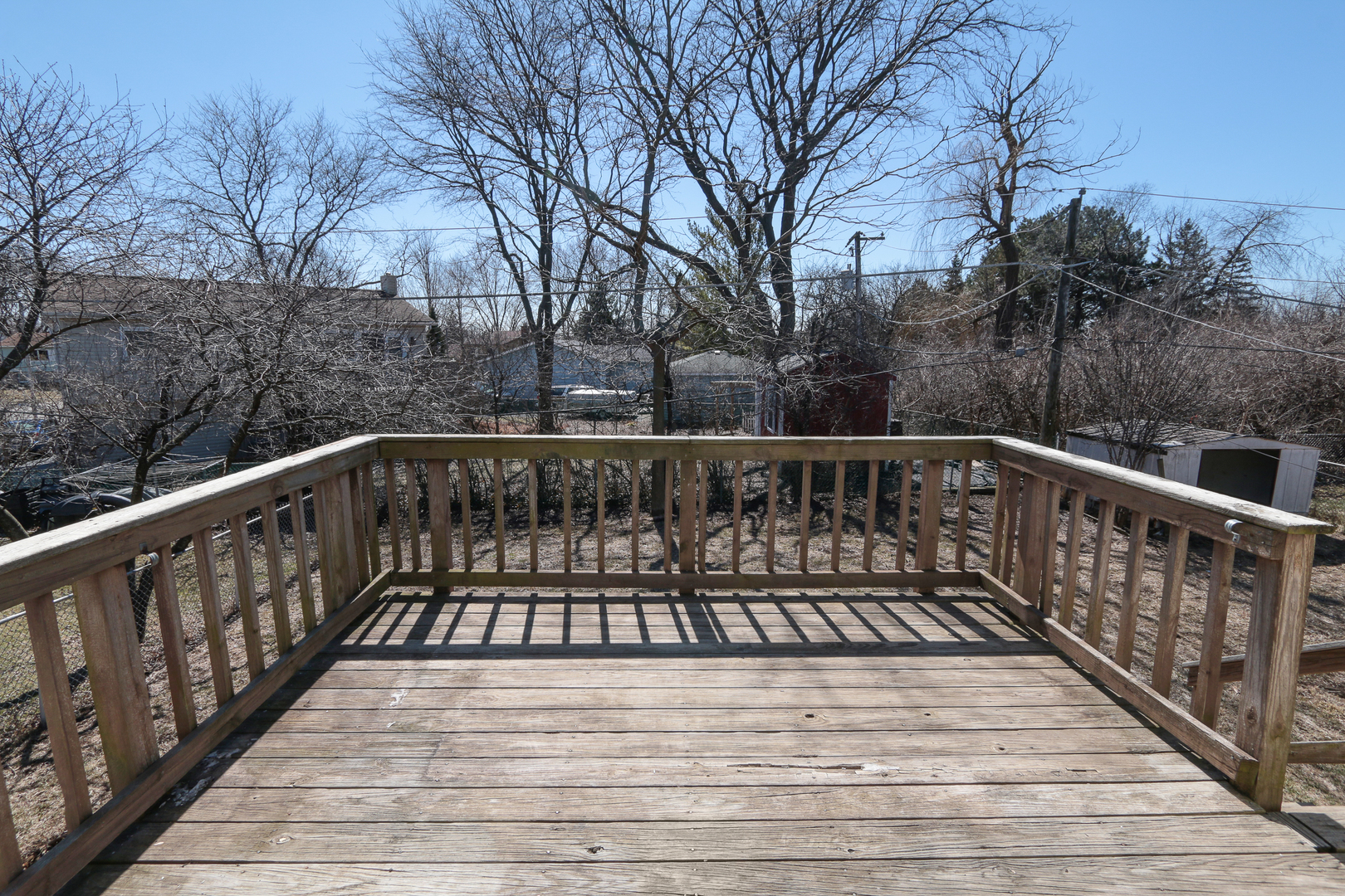 229 Riverside Drive Bolingbrook, IL 60440 - Photo 31 of 35 a view of a wooden deck