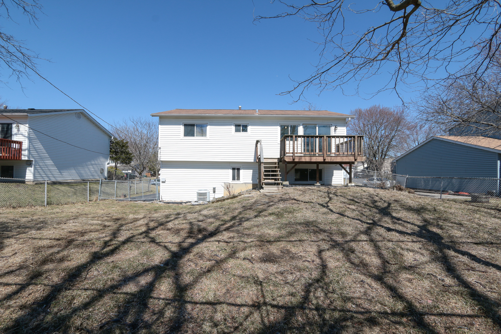 229 Riverside Drive Bolingbrook, IL 60440 - Photo 35 of 35 a front view of a house with a yard