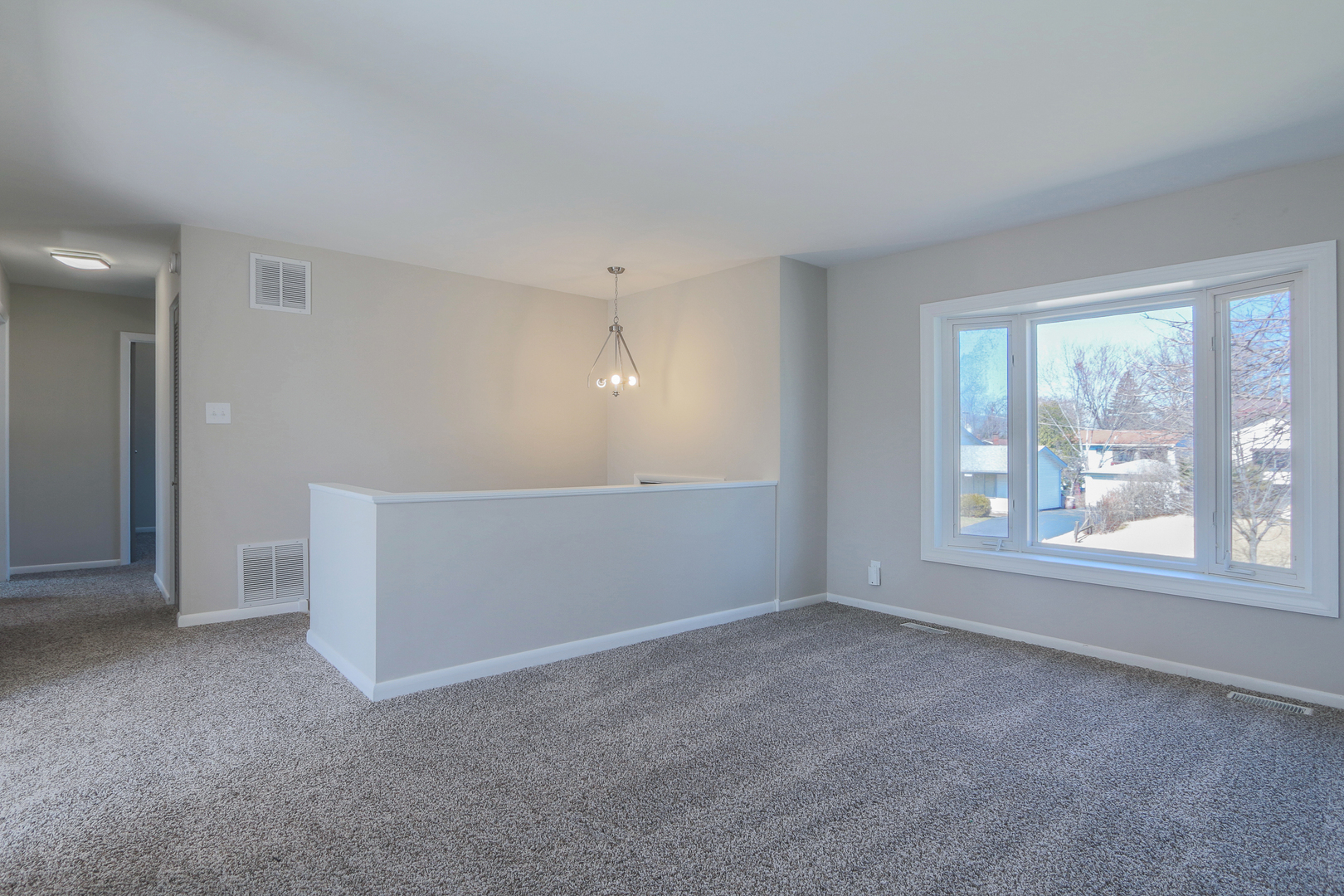 229 Riverside Drive Bolingbrook, IL 60440 - Photo 8 of 35 an empty room with windows