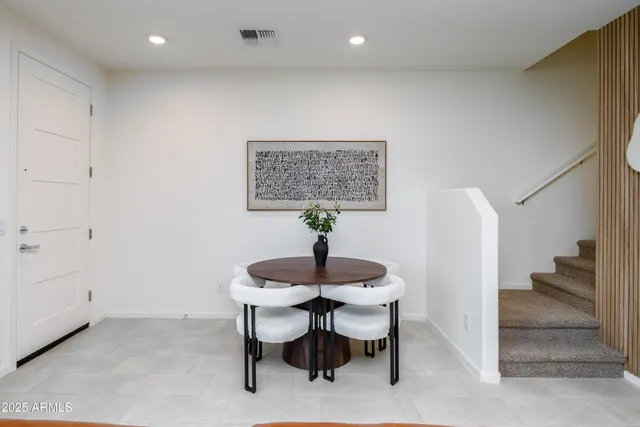 a view of a dining room with furniture