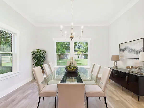 a spacious bedroom with a large bed and a flat screen tv