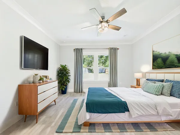a kitchen with kitchen island a counter top stainless steel appliances and cabinets
