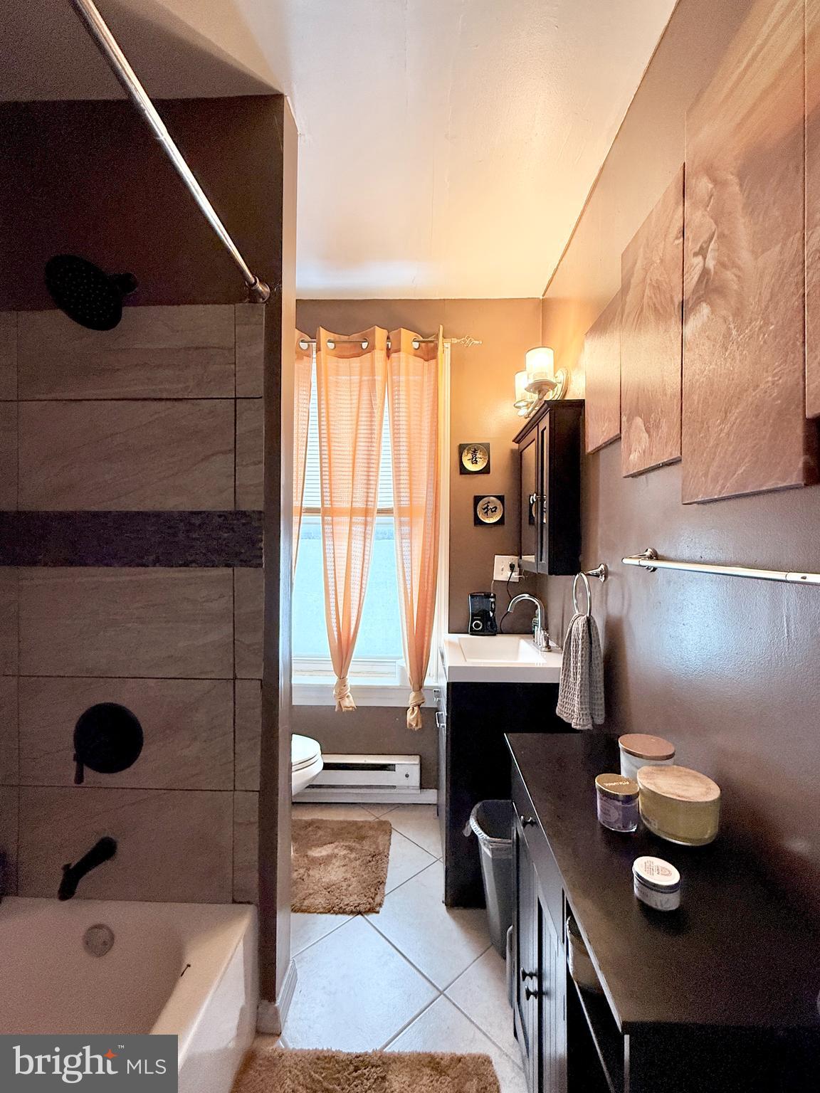 1157 Chestnut Street Camden, NJ 08103 - Photo 11 of 17 a bathroom with a sink and a mirror