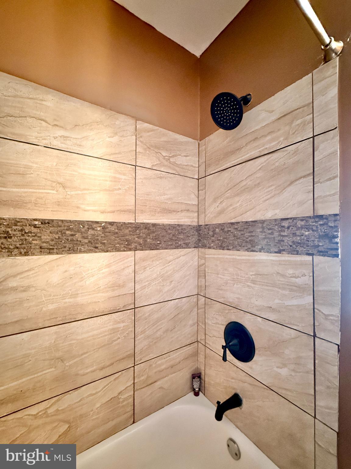 1157 Chestnut Street Camden, NJ 08103 - Photo 12 of 17 a bathroom with a shower