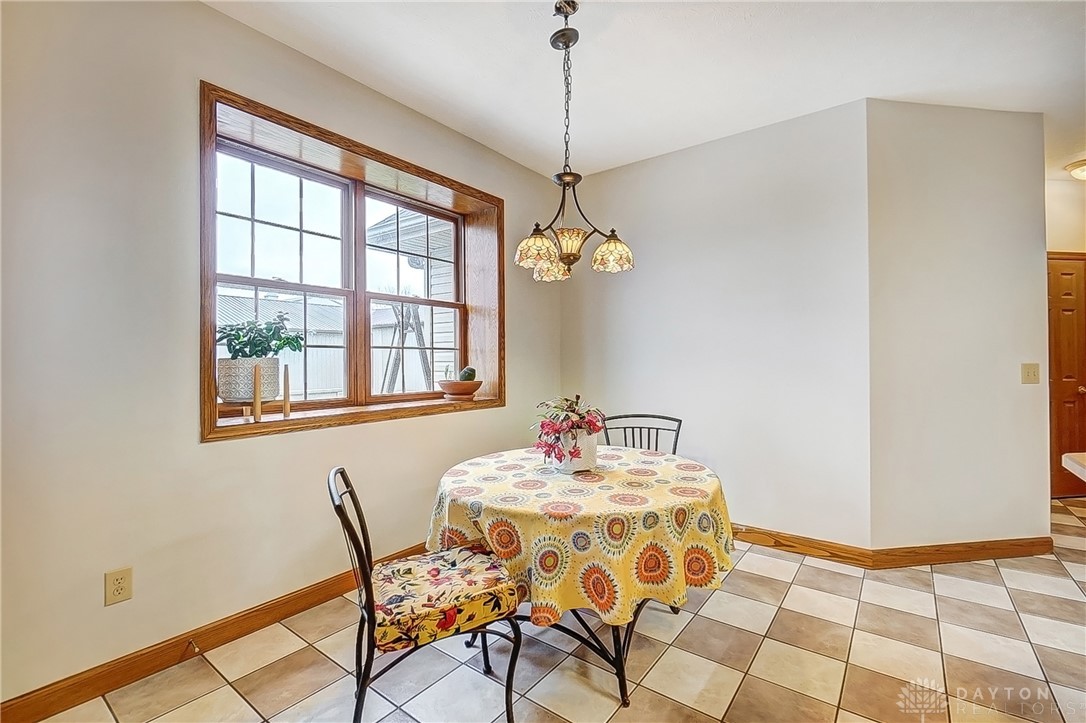 1540 Jasper Road Xenia, OH 45385 - Photo 21 of 91 This bright breakfast area offers a delightful start to your day with ample natural light.