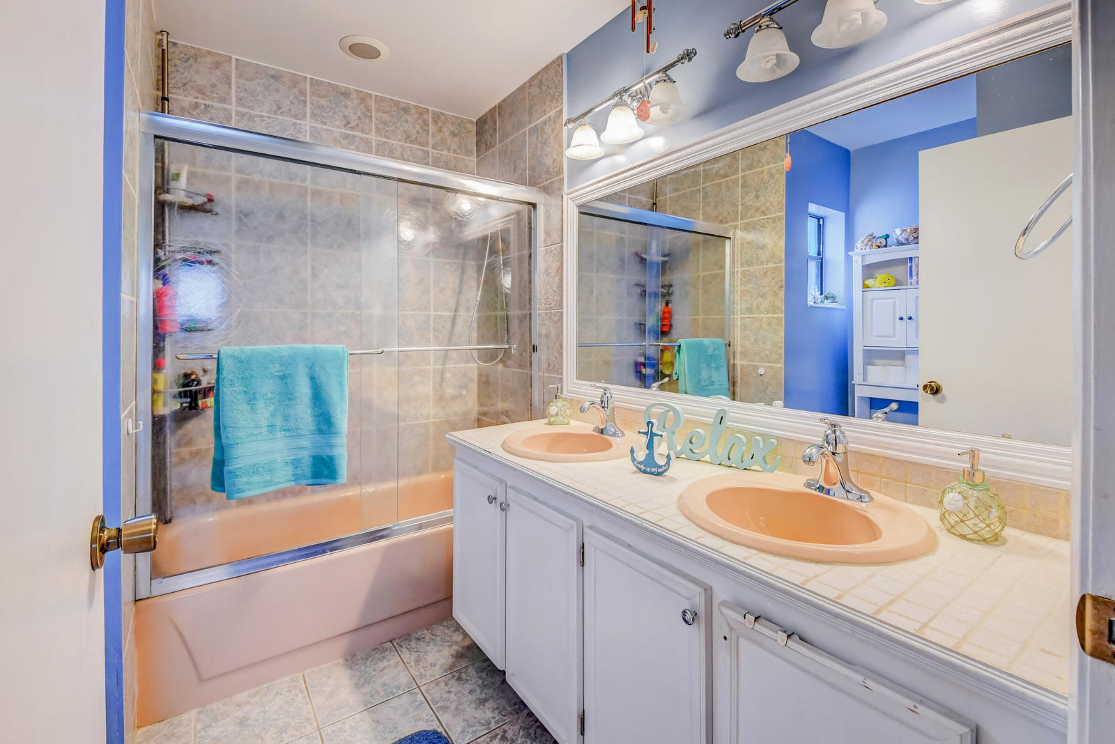 11682 Springflower Place Boca Raton, FL 33428 - Photo 31 of 66 a bathroom with a granite countertop sink a mirror a bathtub and shower