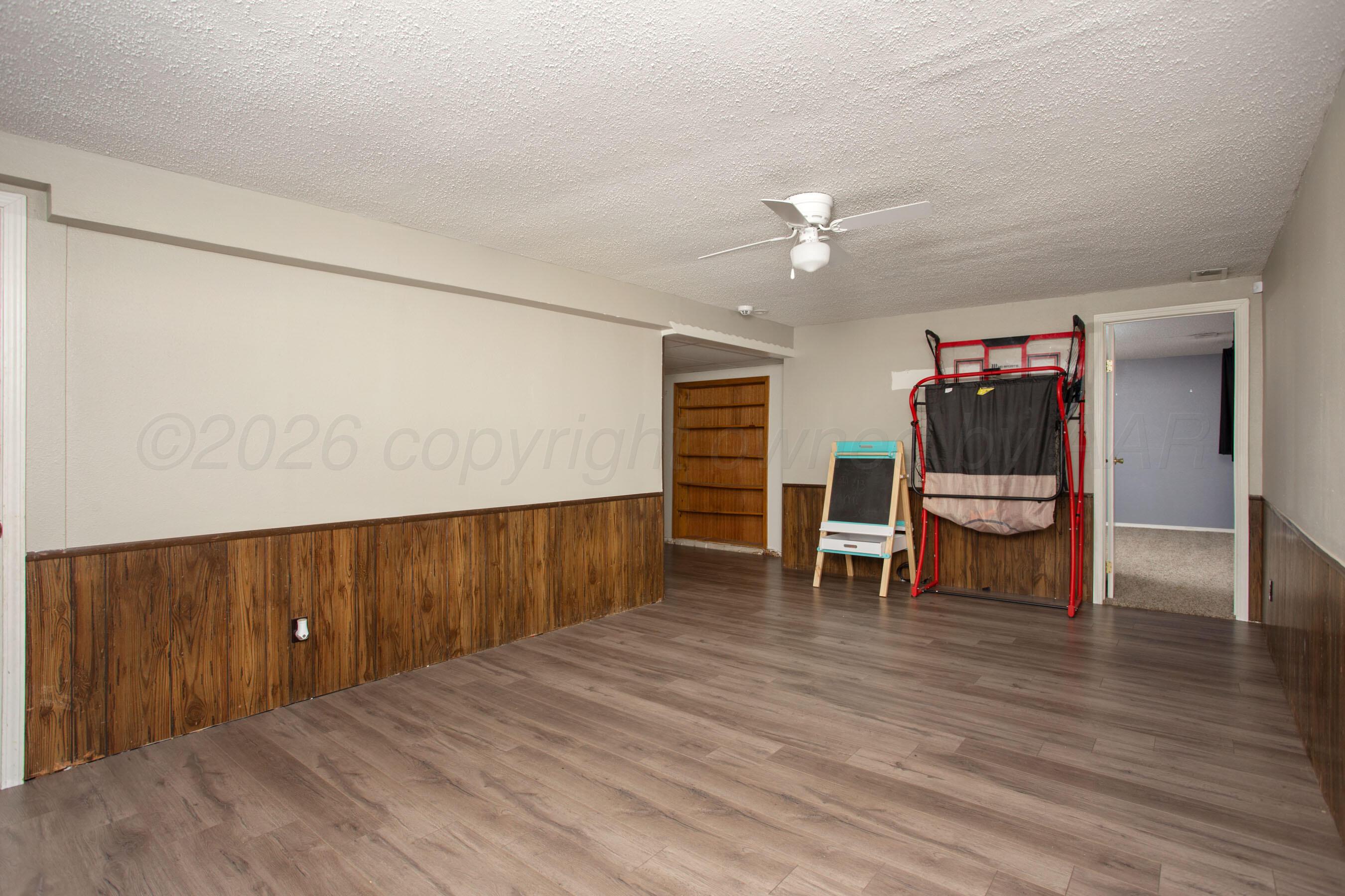 5135 Crockett Street Amarillo, TX 79110 - Photo 20 of 32 Downstairs Living Area