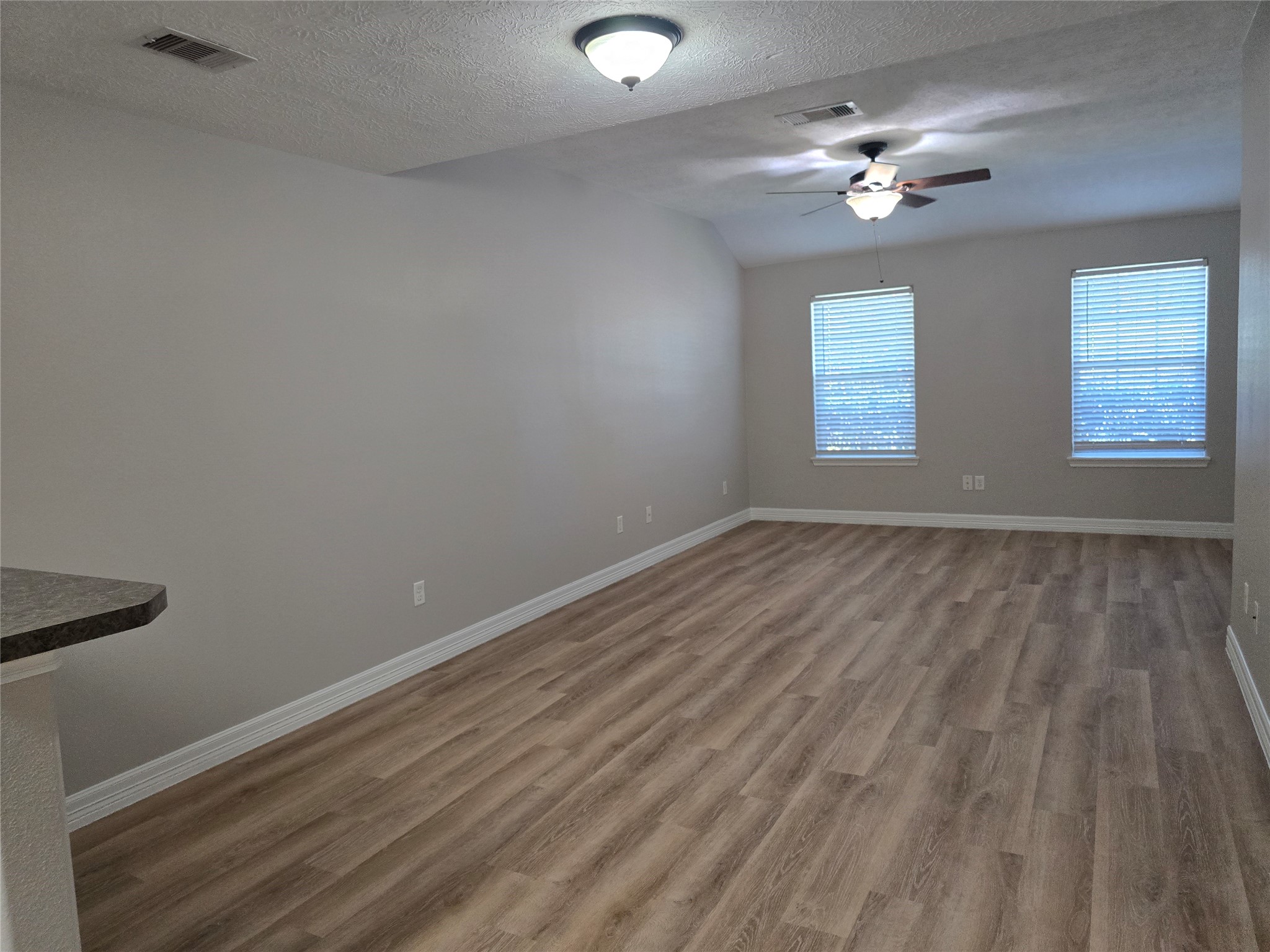 1043 Mann Road, Unit A Conroe, TX 77303 - Photo 4 of 18 New vinyl wood plank flooring throughout.